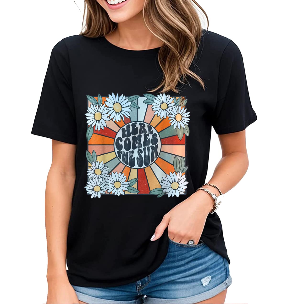 Welcome Sunshine with our "Here Comes The Sun" Hippie Flowers Graphic Shirt