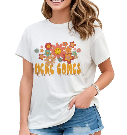 Welcome Sunshine with our "Here Comes The Sun" Hippie Flowers Graphic Shirt